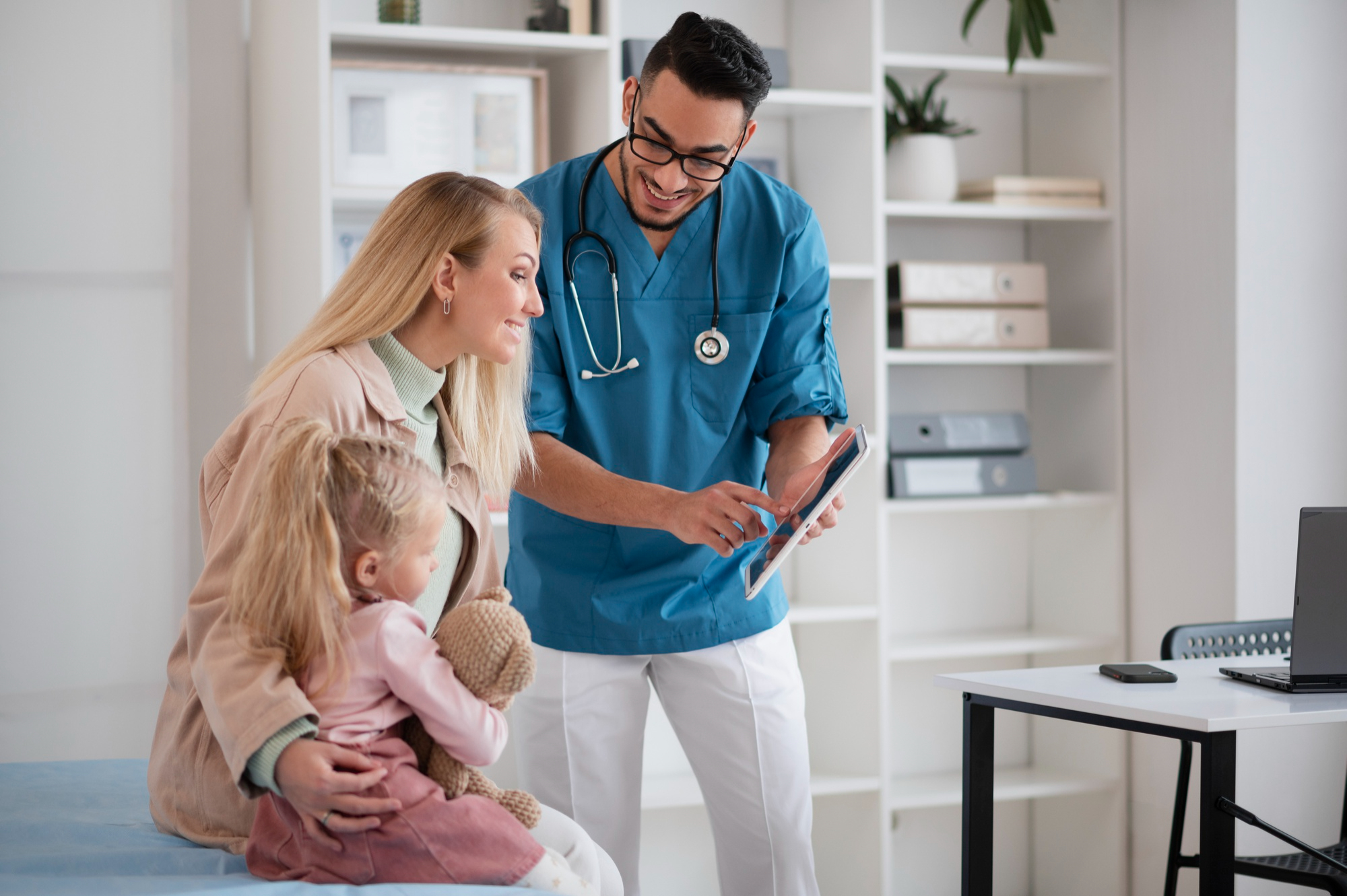Healthcare professional discussing a child's care with a parent